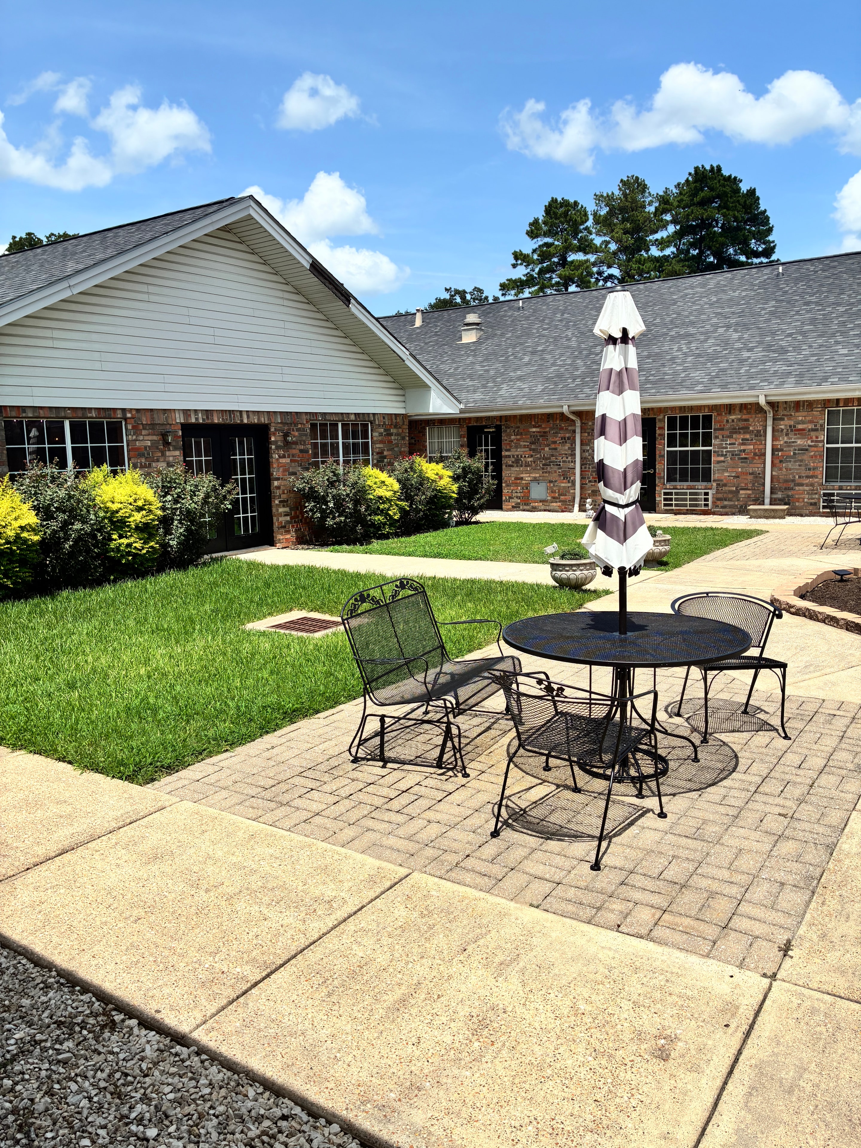Outdoor patio seating area at The Meadows